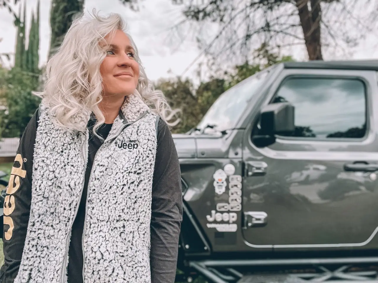 Woman In Jeep Sherpa Vest By Jeep Wrangler