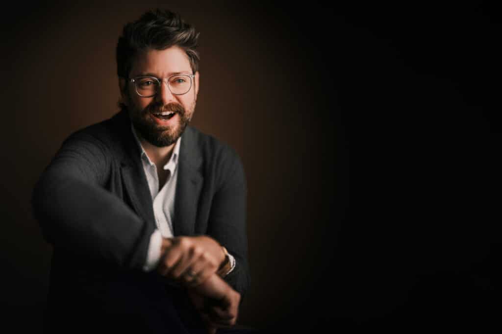 Yates Jarvis, founder of 2 Visions, seated and smiling