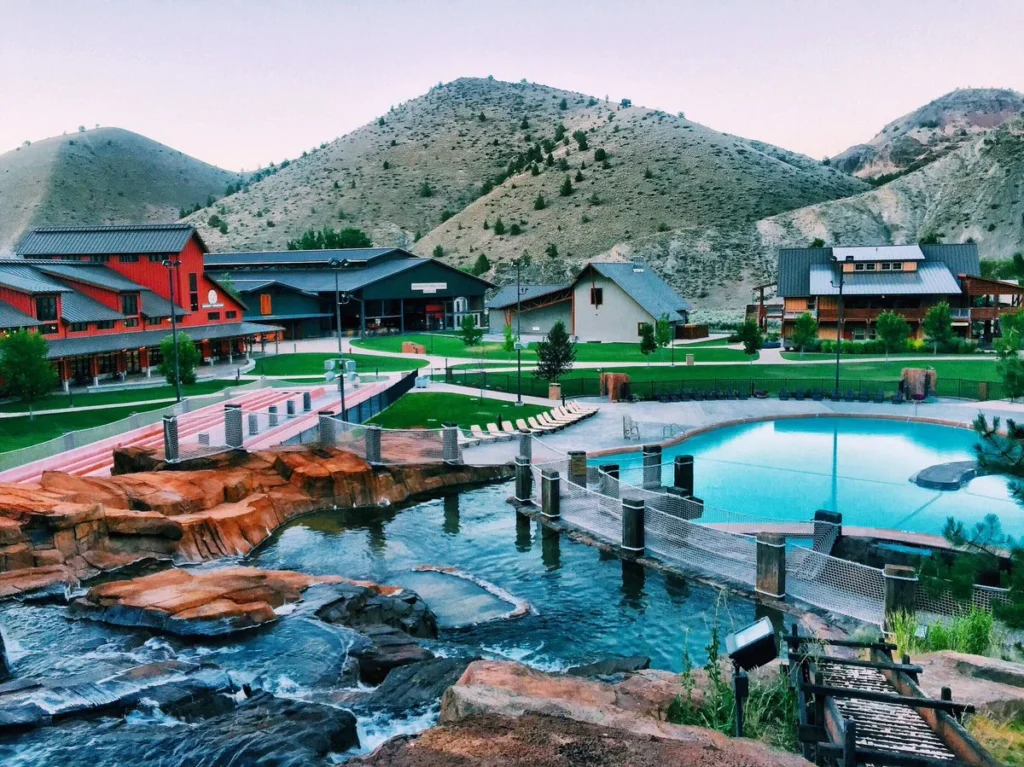 Young Life client highlight: mountain camp campus with pool at dusk